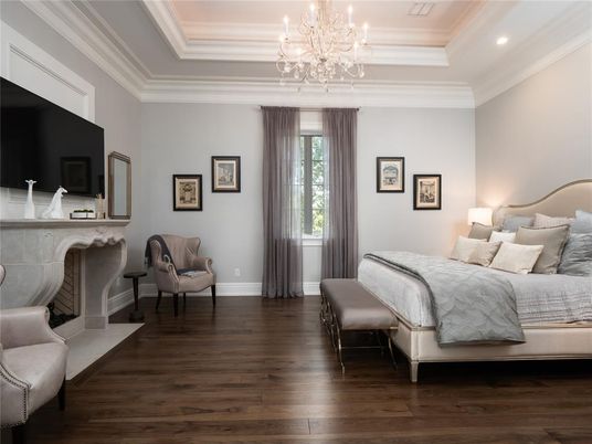 Bedroom, Chandelier, Fireplace, Interior, Recessed Lighting, Wood Texture Flooring