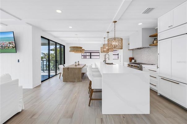 Dining room, Interior, Kitchen, Pendant Lights, Recessed Lighting, Stainless Steel Appliances, Wood Texture Flooring
