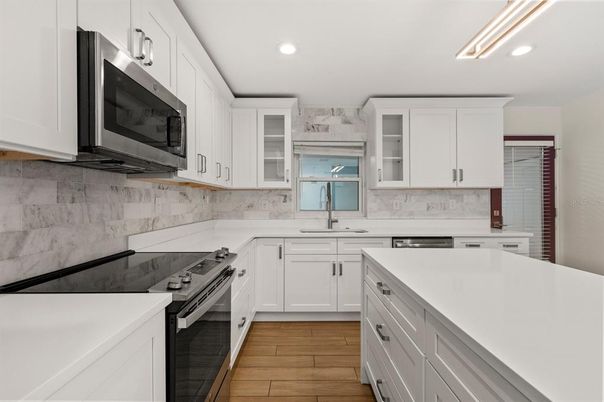 Interior, Kitchen, Recessed Lighting, Stainless Steel Appliances, Wood Texture Flooring