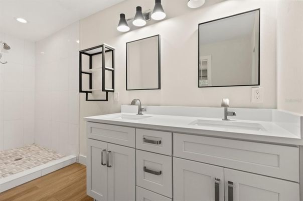 Bathroom, Dual Sink Vanities, Interior, Recessed Lighting, Wood Texture Flooring