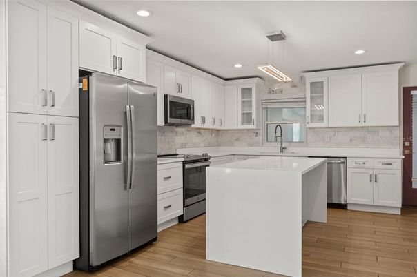 Interior, Kitchen, Pendant Lights, Recessed Lighting, Stainless Steel Appliances, Wood Texture Flooring