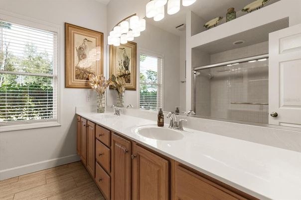 Bathroom, Dual Sink Vanities, Glass Shower, Interior, Wood Texture Flooring