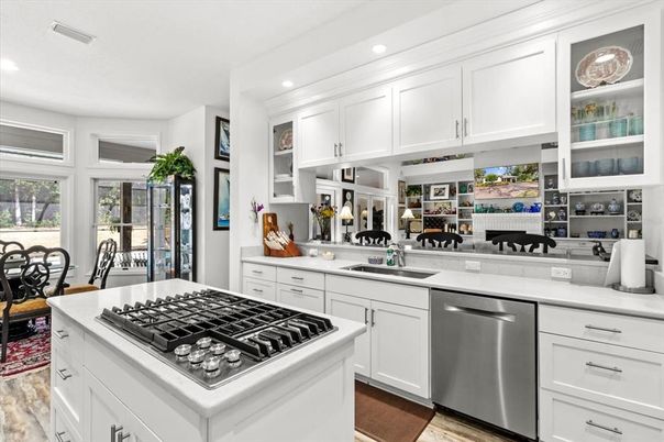 Dining room, Interior, Kitchen, Recessed Lighting, Stainless Steel Appliances, Wood Texture Flooring