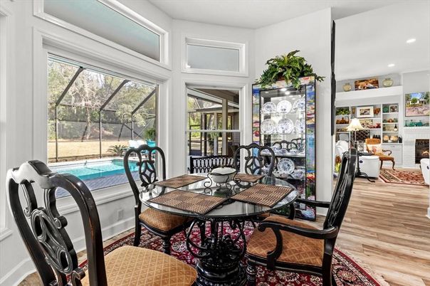 Dining room, Fireplace, Glass Ceilings, Interior, Living room, Pool, Recessed Lighting, Sun Room, Wood Texture Flooring