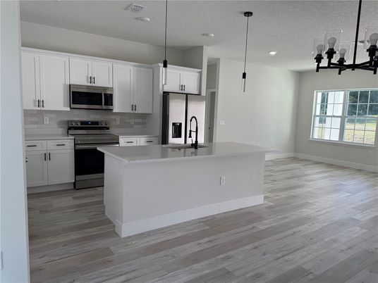 Interior, Kitchen, Pendant Lights, Recessed Lighting, Stainless Steel Appliances, Wood Texture Flooring