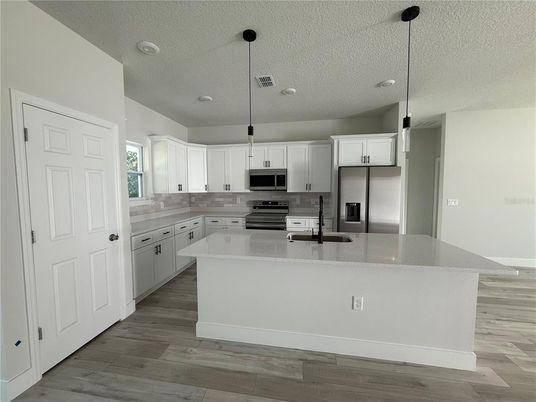 Interior, Kitchen, Pendant Lights, Recessed Lighting, Stainless Steel Appliances, Wood Texture Flooring