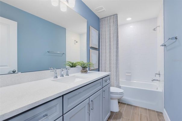 Bathroom, Dual Sink Vanities, Interior, Recessed Lighting, Wood Texture Flooring