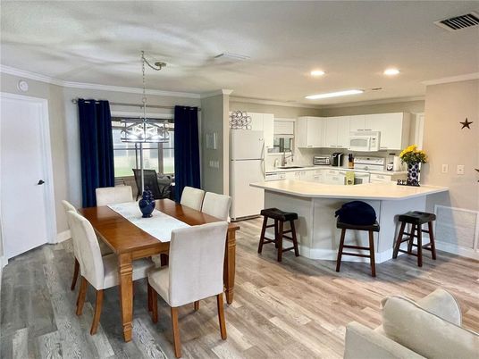Dining room, Interior, Kitchen, Pendant Lights, Recessed Lighting, Stainless Steel Appliances, Wood Texture Flooring