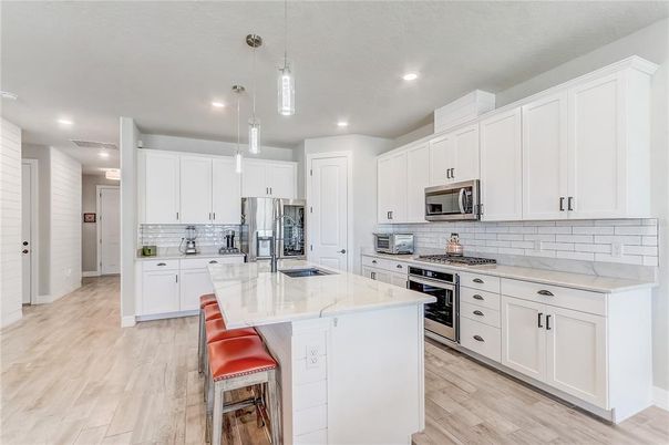 Interior, Kitchen, Pendant Lights, Recessed Lighting, Stainless Steel Appliances, Wood Texture Flooring