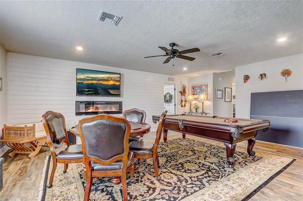 Billiard Table, Fireplace, Game Room, Interior, Recessed Lighting, Wood Texture Flooring