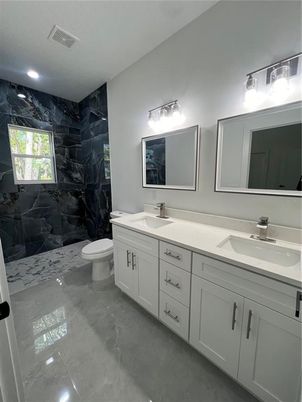 Bathroom, Dual Sink Vanities, Interior, Marble Walls, Recessed Lighting
