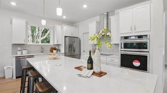 Interior, Kitchen, Pendant Lights, Recessed Lighting, Stainless Steel Appliances, Wood Texture Flooring