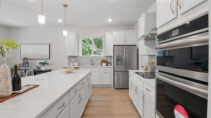 Interior, Kitchen, Pendant Lights, Recessed Lighting, Stainless Steel Appliances, Wood Texture Flooring