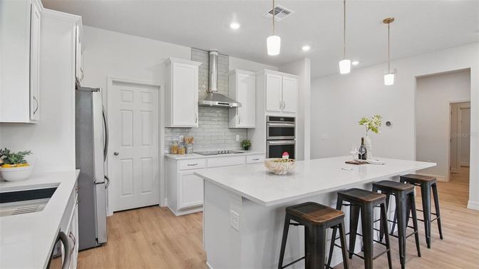 Interior, Kitchen, Pendant Lights, Recessed Lighting, Stainless Steel Appliances, Wood Texture Flooring