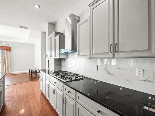 Interior, Kitchen, Marble Walls, Recessed Lighting, Wood Texture Flooring