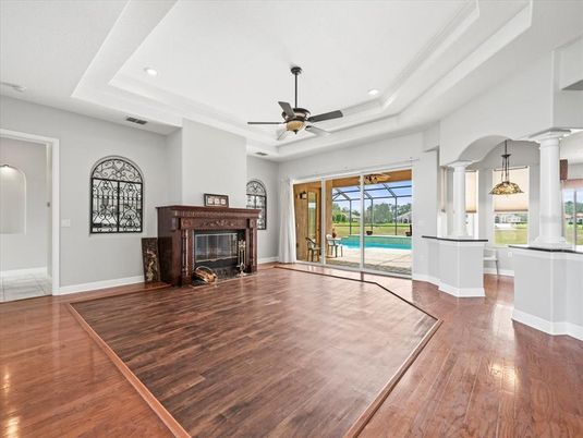 Fireplace, Interior, Pendant Lights, Recessed Lighting, Wood Texture Flooring