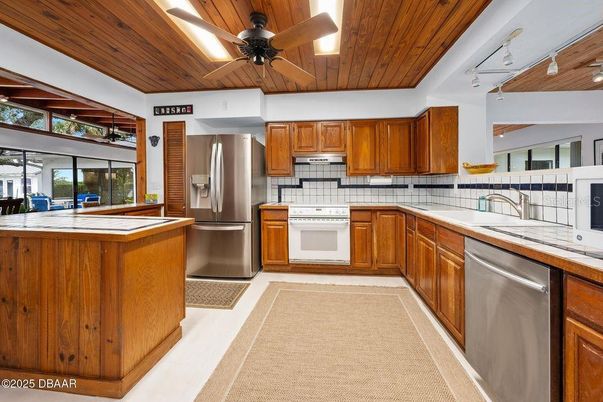 Interior, Kitchen, Stainless Steel Appliances, Tile Countertops, Wooden Ceilings