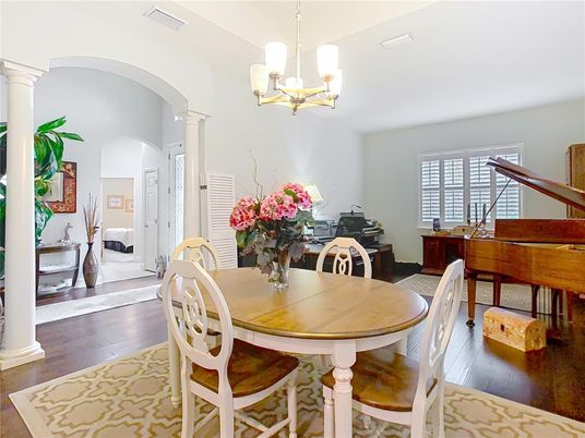 Chandelier, Dining room, Interior, Piano, Wood Texture Flooring