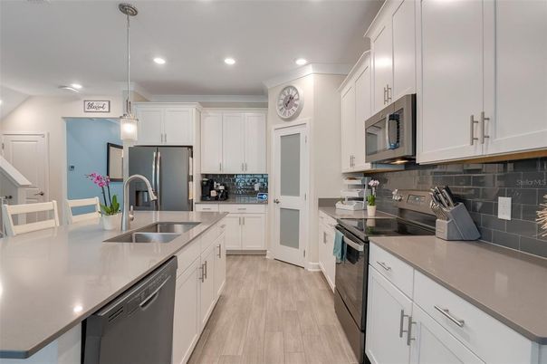 Interior, Kitchen, Pendant Lights, Recessed Lighting, Stainless Steel Appliances, Wood Texture Flooring