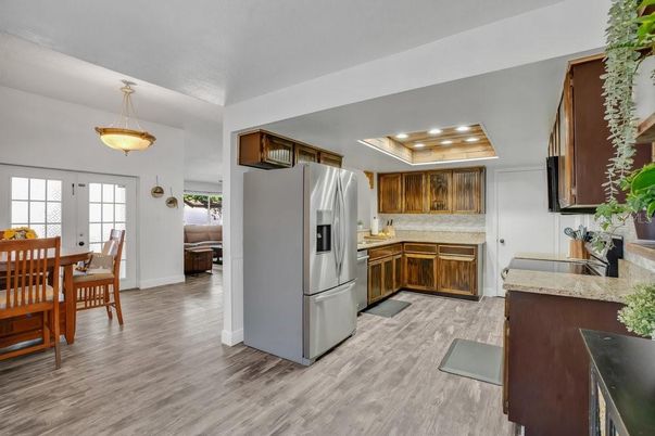 Dining room, Interior, Kitchen, Pendant Lights, Stainless Steel Appliances, Wood Texture Flooring