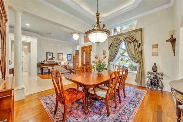 Dining room, Interior, Pendant Lights, Piano, Recessed Lighting, Wood Texture Flooring