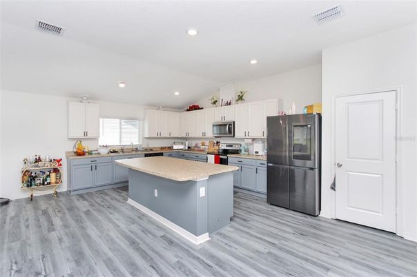 Interior, Kitchen, Recessed Lighting, Stainless Steel Appliances, Wood Texture Flooring
