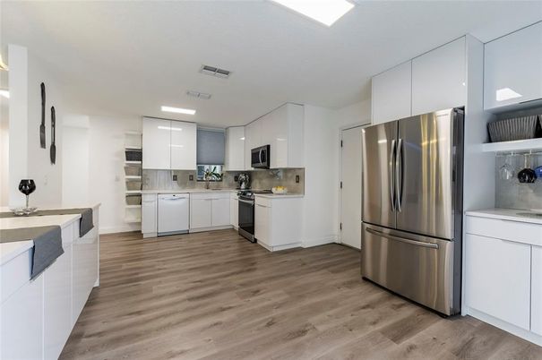 Interior, Kitchen, Recessed Lighting, Stainless Steel Appliances, Wood Texture Flooring