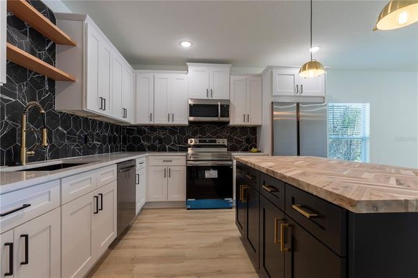 Interior, Kitchen, Pendant Lights, Recessed Lighting, Stainless Steel Appliances, Wood Texture Flooring