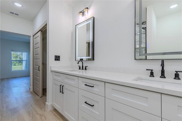 Bathroom, Dual Sink Vanities, Interior, Recessed Lighting, Wood Texture Flooring