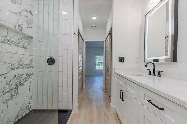 Bathroom, Interior, Marble Walls, Recessed Lighting, Wood Texture Flooring
