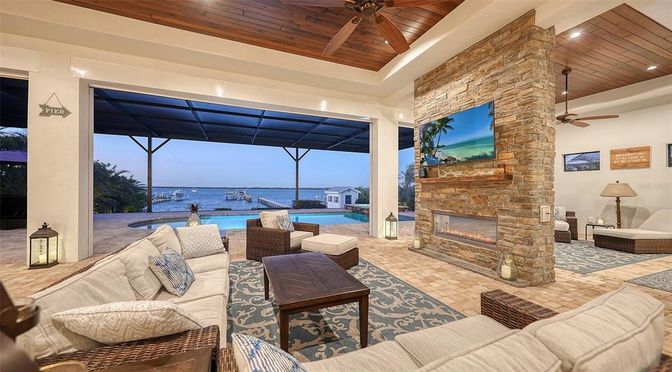 Fireplace, Interior, Living room, Recessed Lighting, Stone Walls, Water, Wooden Ceilings