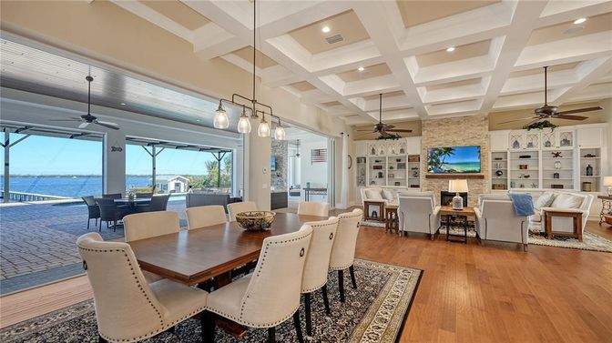 Dining room, Interior, Living room, Pendant Lights, Recessed Lighting, Stone Walls, Water, Wood Texture Flooring