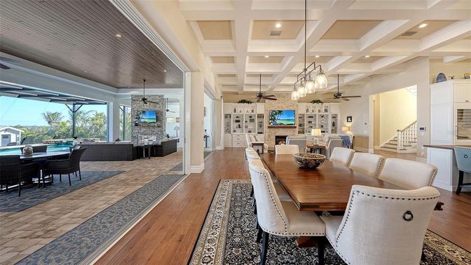 Dining room, Fireplace, Interior, Living room, Pendant Lights, Recessed Lighting, Stone Walls, Wood Texture Flooring