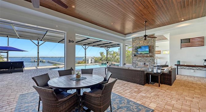 Dining room, Exterior, Fireplace, Interior, Living room, Pool, Water, Wooden Ceilings