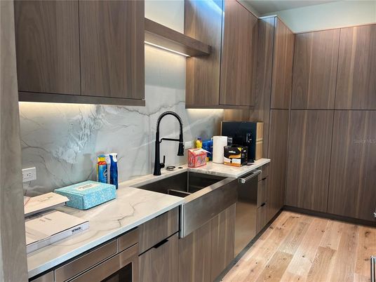 Interior, Kitchen, Marble Walls, Stainless Steel Appliances, Wood Texture Flooring