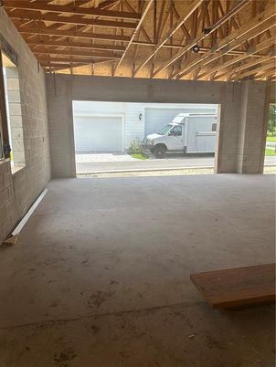 Garage, Interior, Stone Walls, Wooden Beams