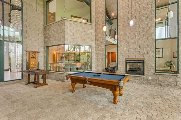 Billiard Table, Fireplace, Game Room, Interior, Pendant Lights, Stone Walls