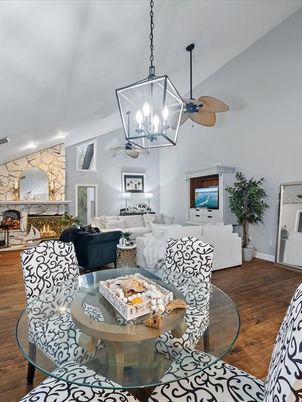 Dining room, Fireplace, Interior, Living room, Pendant Lights, Stone Walls, Wood Texture Flooring