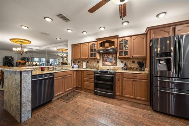 Chandelier, Interior, Kitchen, Recessed Lighting, Stainless Steel Appliances, Wood Texture Flooring