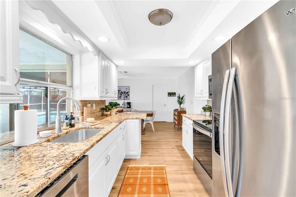 Interior, Kitchen, Recessed Lighting, Stainless Steel Appliances, Wood Texture Flooring
