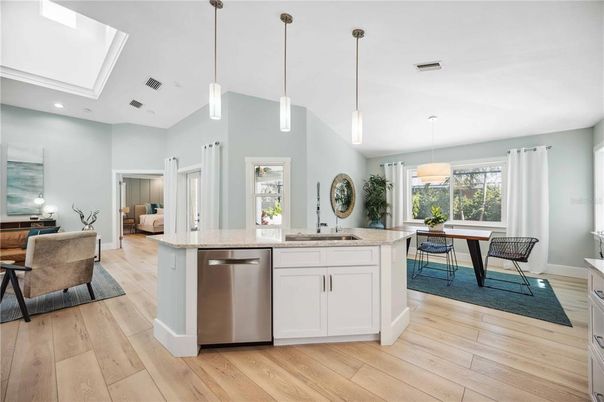 Dining room, Interior, Kitchen, Living room, Pendant Lights, Recessed Lighting, Stainless Steel Appliances, Wood Texture Flooring