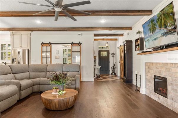 Fireplace, Interior, Kitchen, Living room, Pendant Lights, Recessed Lighting, Stone Walls, Wooden Beams, Wood Texture Flooring