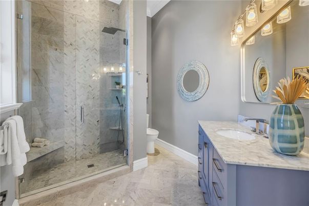 Bathroom, Dual Sink Vanities, Glass Shower, Interior, Marble, Marble Walls