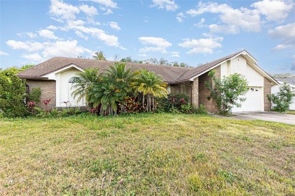 Attached, Backyard, Exterior, Facade, Brick Facade, Ranch