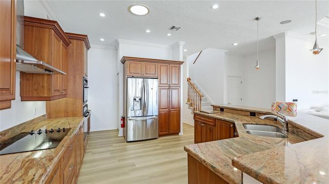 Interior, Kitchen, Pendant Lights, Recessed Lighting, Stainless Steel Appliances, Wood Texture Flooring