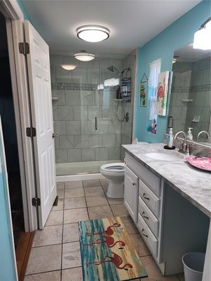 Bathroom, Dual Sink Vanities, Glass Shower, Interior, Marble Walls