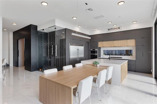 Dining room, Interior, Kitchen, Marble, Pendant Lights, Recessed Lighting, Stainless Steel Appliances