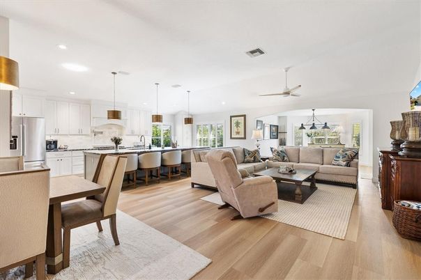 Dining room, Interior, Kitchen, Living room, Pendant Lights, Recessed Lighting, Stainless Steel Appliances, Wood Texture Flooring