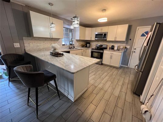 Interior, Kitchen, Pendant Lights, Stainless Steel Appliances, Wood Texture Flooring