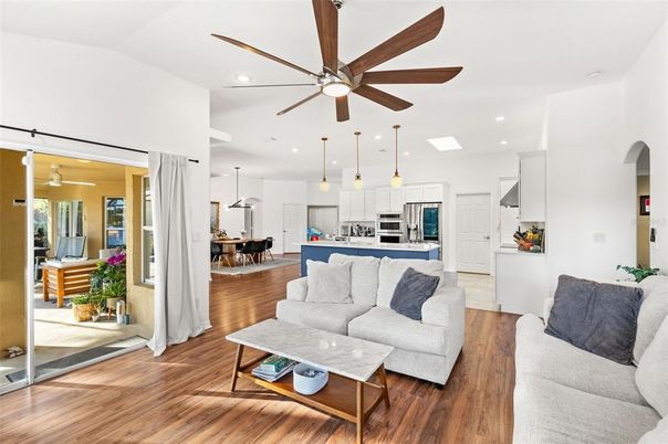 Dining room, Interior, Kitchen, Living room, Pendant Lights, Recessed Lighting, Stainless Steel Appliances, Wood Texture Flooring